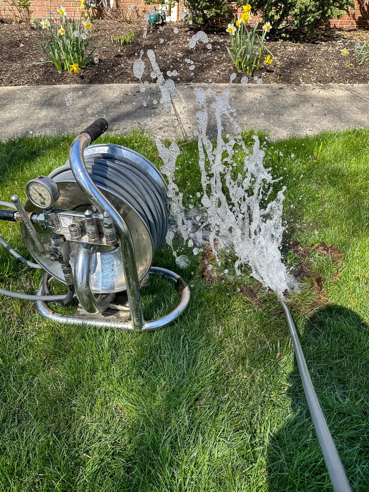 Clear water flowing from drain after hydrojetting service